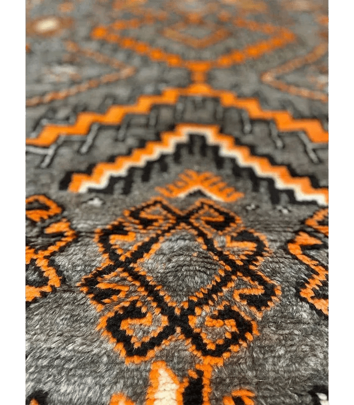 Moroccan Ait Ouaouzguite Wool Rug – 4 ft 8 in × 8 ft, Dark Grey & Orange - Cooperative Atma
