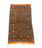 Moroccan Ait Ouaouzguite Wool Rug – 4 ft 8 in × 8 ft, Dark Grey & Orange - Cooperative Atma